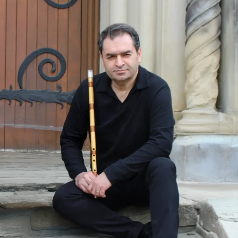 Close-up of Persian ney fingering during a lesson